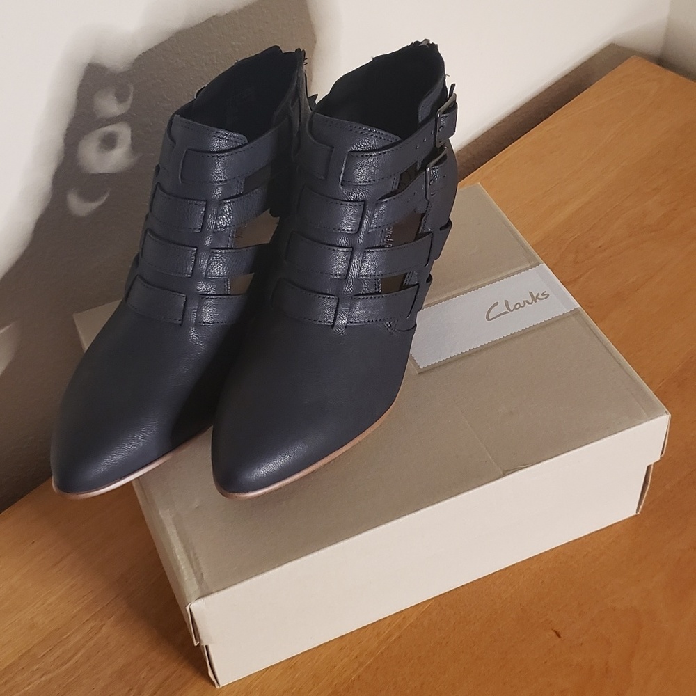 Black Clarks booties with wooden heel
